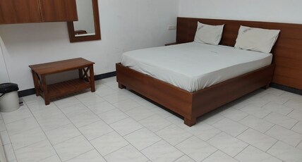 Pleasant plaza tourist home Room Type - AC DELUXE Pleasant plaza tourist home Room Type - AC DELUXE