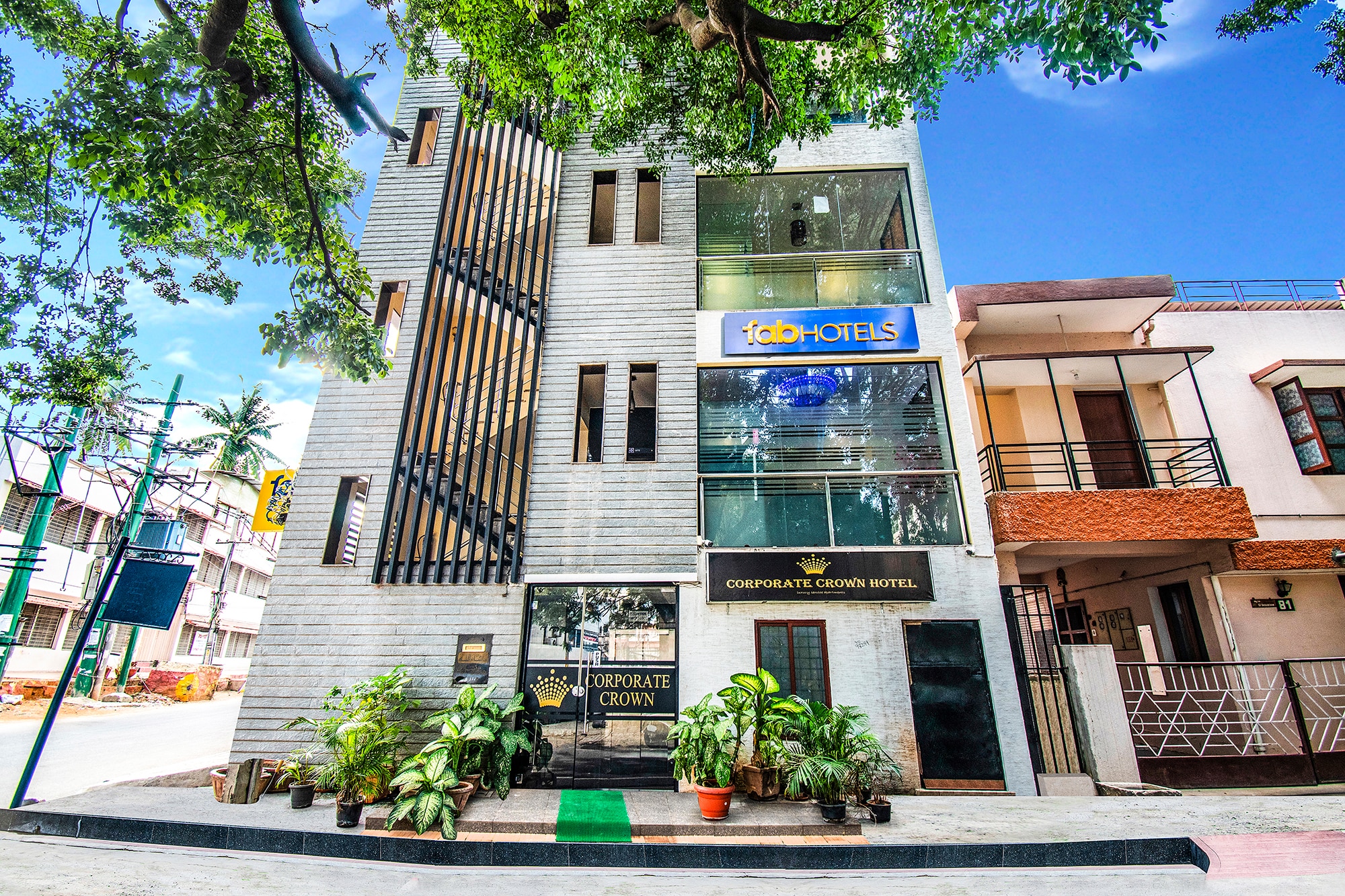 FabHotel Corporate Crown - Nr. Jyoti Nivas University - Tap to explore photos