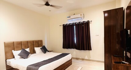 The Anandam Palace Room Type - DELUXE ROOM WITH LAWN VIEW The Anandam Palace Room Type - DELUXE ROOM WITH LAWN VIEW