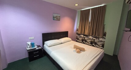 Hotel O Peneka Inn Room Type - Deluxe Queen