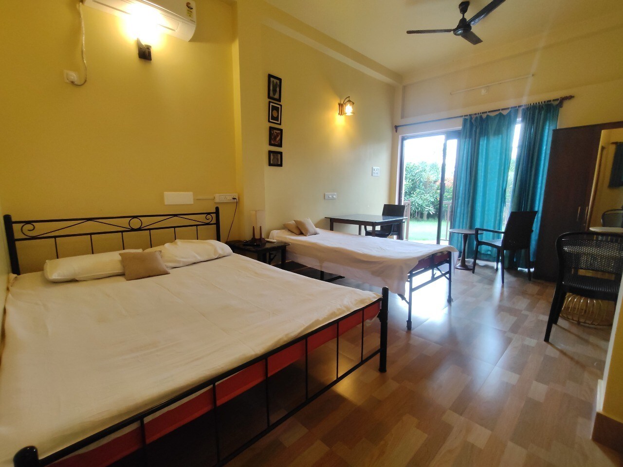 Bishwamoni Baganbari Deluxe Rooms - Tap to explore photos