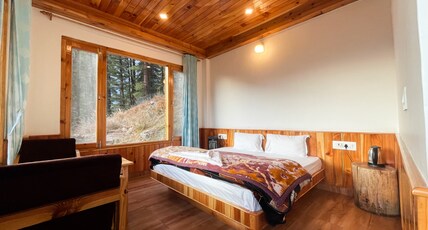 Singing Woods Kutla Room Type - Cottage Bedroom