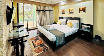 Posh Suites Golf Course Road Room Type - Deluxe Suites