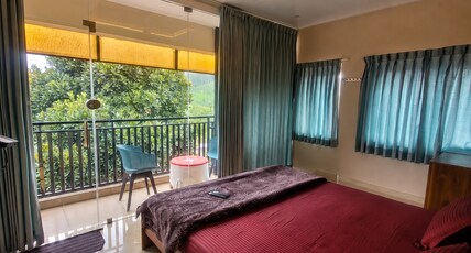 Vasu Inn - Rooms in Valparai Room Type - Premium Single with Balcony