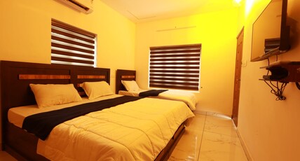 SR Meridian | Near Padmanabhaswami temple Room Type - Four sharing Room
