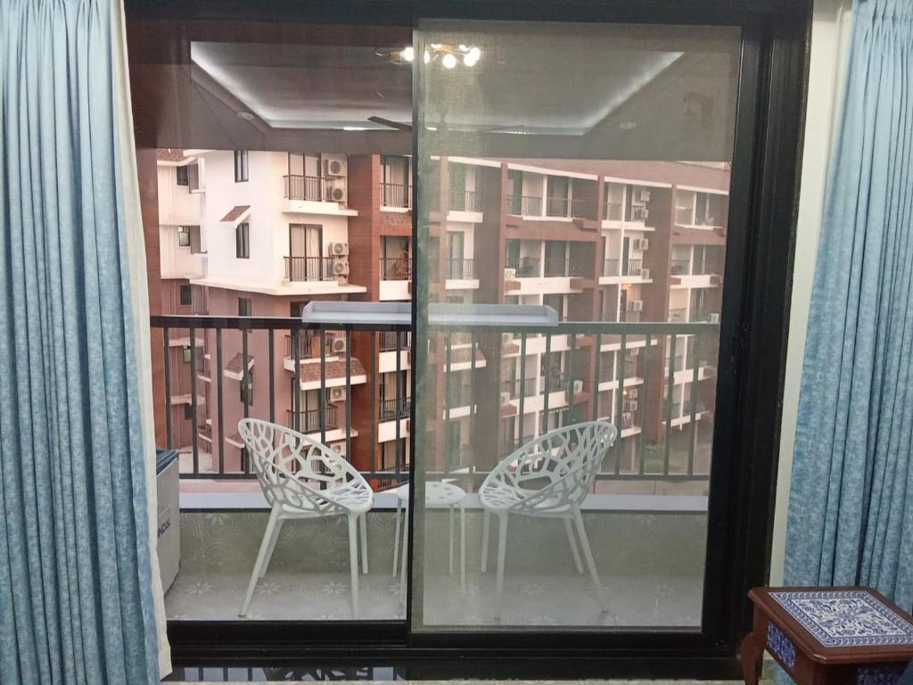 Shubhakanksha 1BHK Candolim - Tap to explore photos