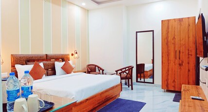 HOTEL GREEN PLAZA Room Type - Deluxe Room with Smart LED TV