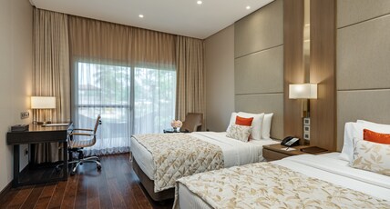 Palm Meadows Resort Room Type - Deluxe Twin Room Pool View