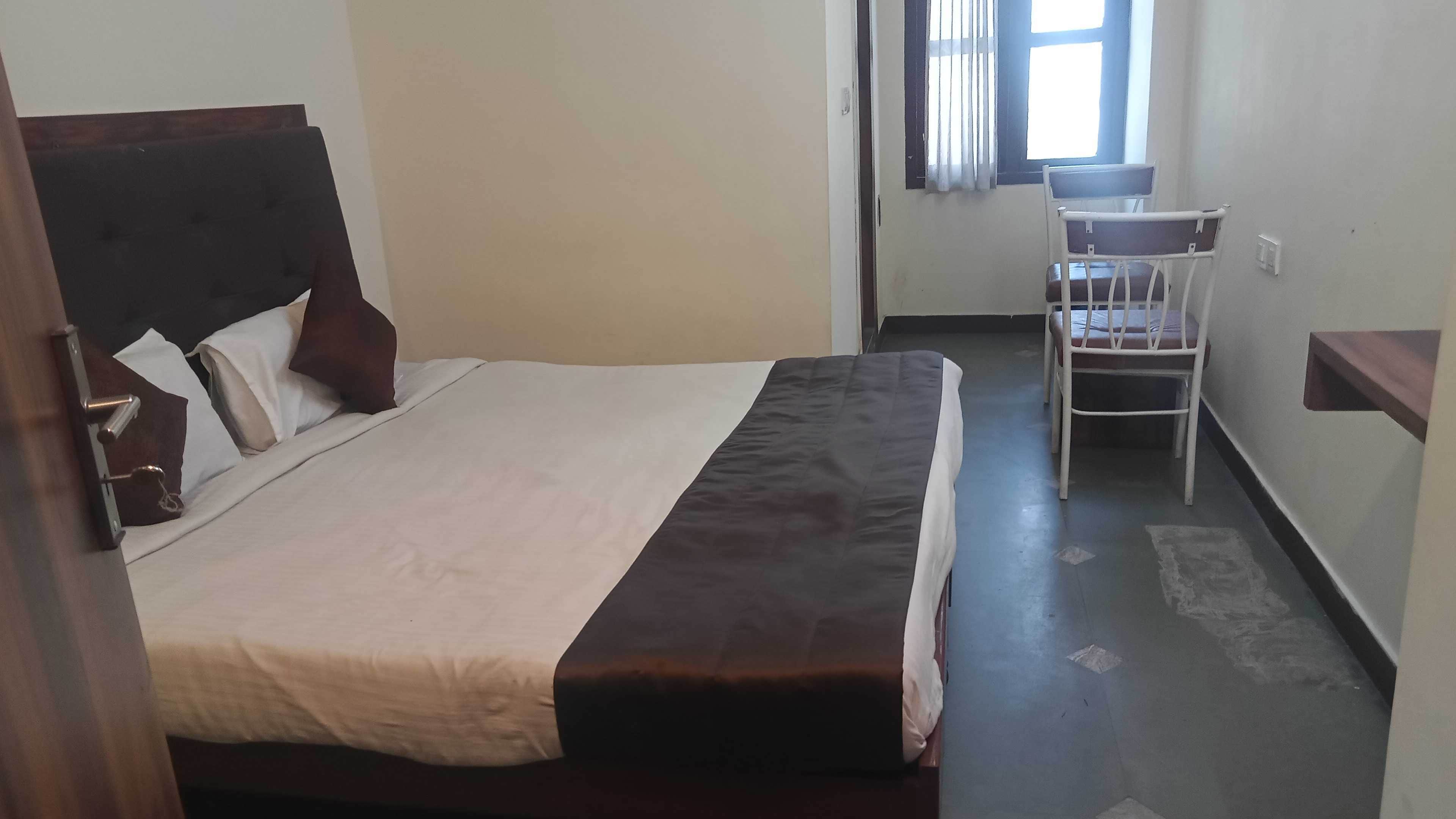 Hotel O Kaveri Stay Inn Luxury Rooms - Tap to explore photos