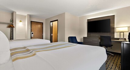 SureStay Plus Hotel by Best Western Tulsa East Room Type - 2 Queen Beds, Non-Smoking, Flat Screen Television, Sofa Chair, Work Desk, Microwave And Refrigerator SureStay Plus Hotel by Best Western Tulsa East Room Type - 2 Queen Beds, Non-Smoking, Flat Screen Television, Sofa Chair, Work Desk, Microwave And Refrigerator