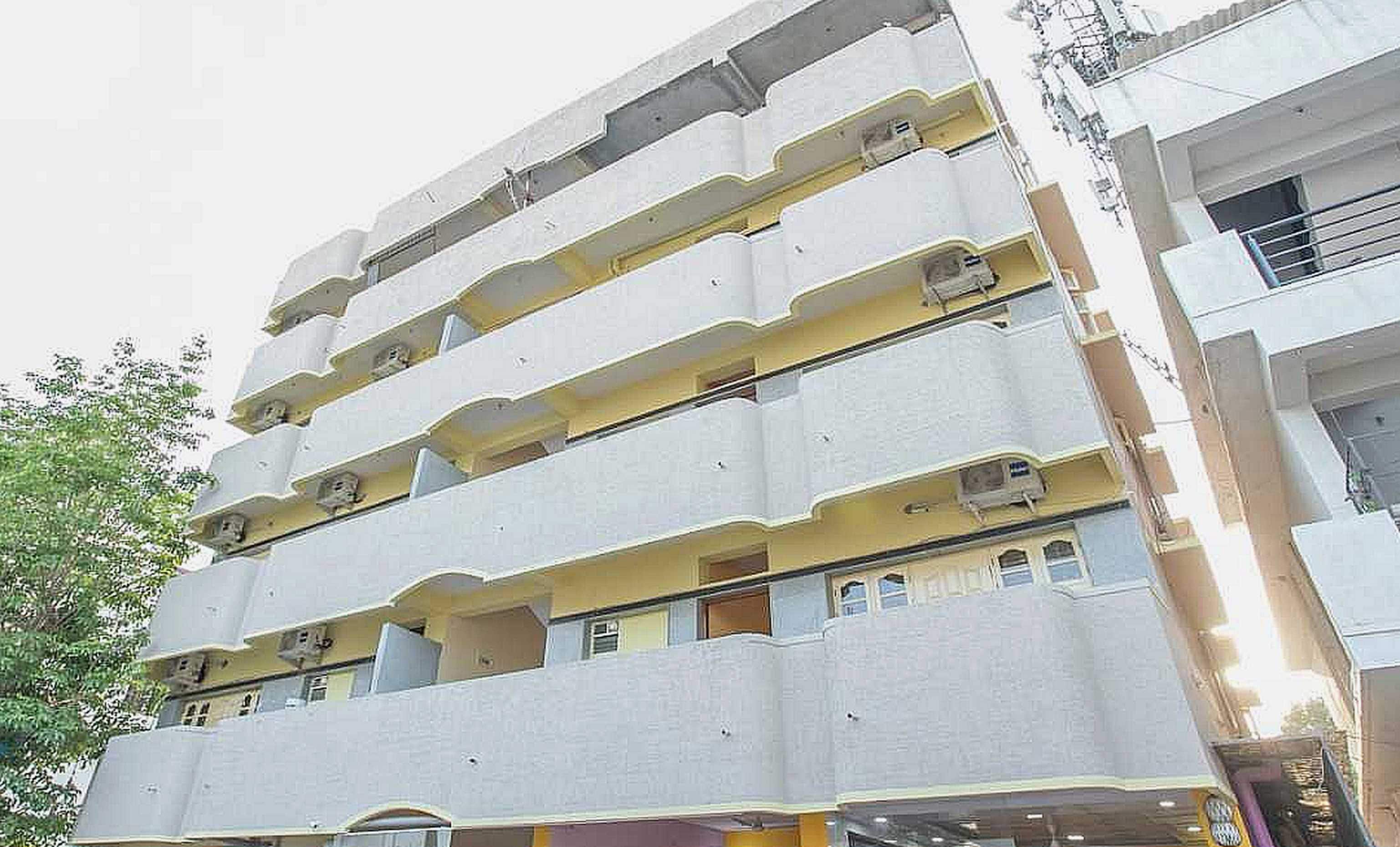 Hotel O Blossom Suites - Tap to explore photos