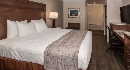 Best Western Bishop Lodge Room Type - 1 King Bed, Mobility Accessible, Roll In Shower, Non-Smoking, Continental Breakfast Best Western Bishop Lodge Room Type - 1 King Bed, Mobility Accessible, Roll In Shower, Non-Smoking, Continental Breakfast