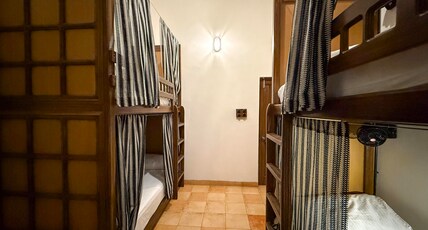 Malkin Hostel Room Type - Bed in 4 Bed Mixed AC Dormitory Room with Shared Bathroom