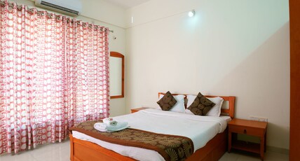 EMA Family Rooms Room Type - Ac Deluxe room with attached bathroom