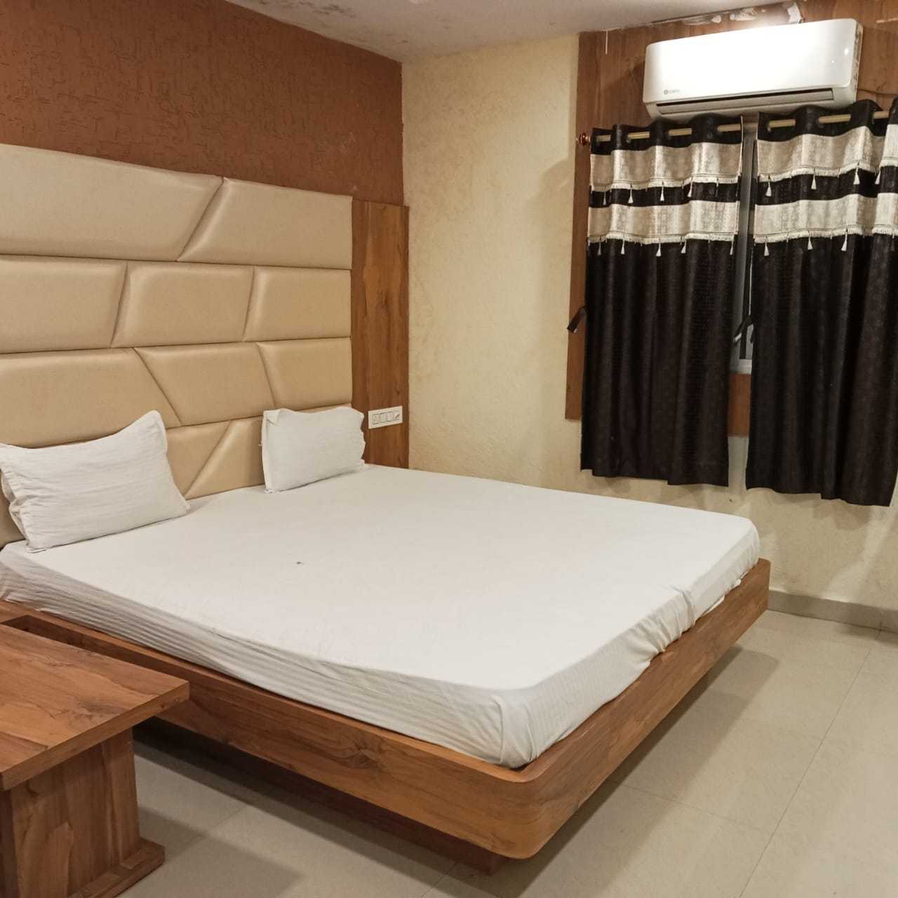 OYO Flagship 814798 Hotel The Stay Within - Tap to explore photos