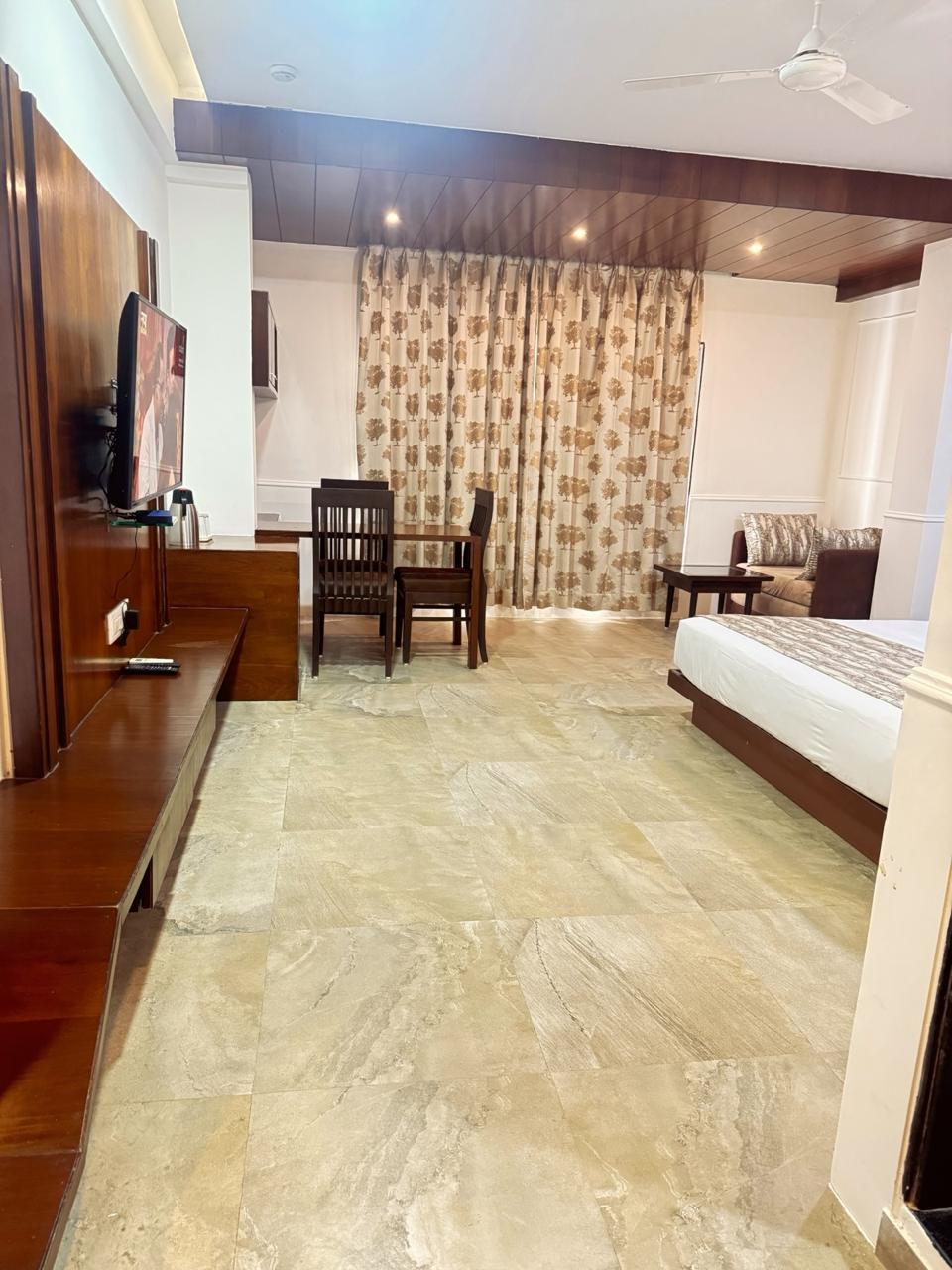 Hotel Rajdhani - Tap to explore photos