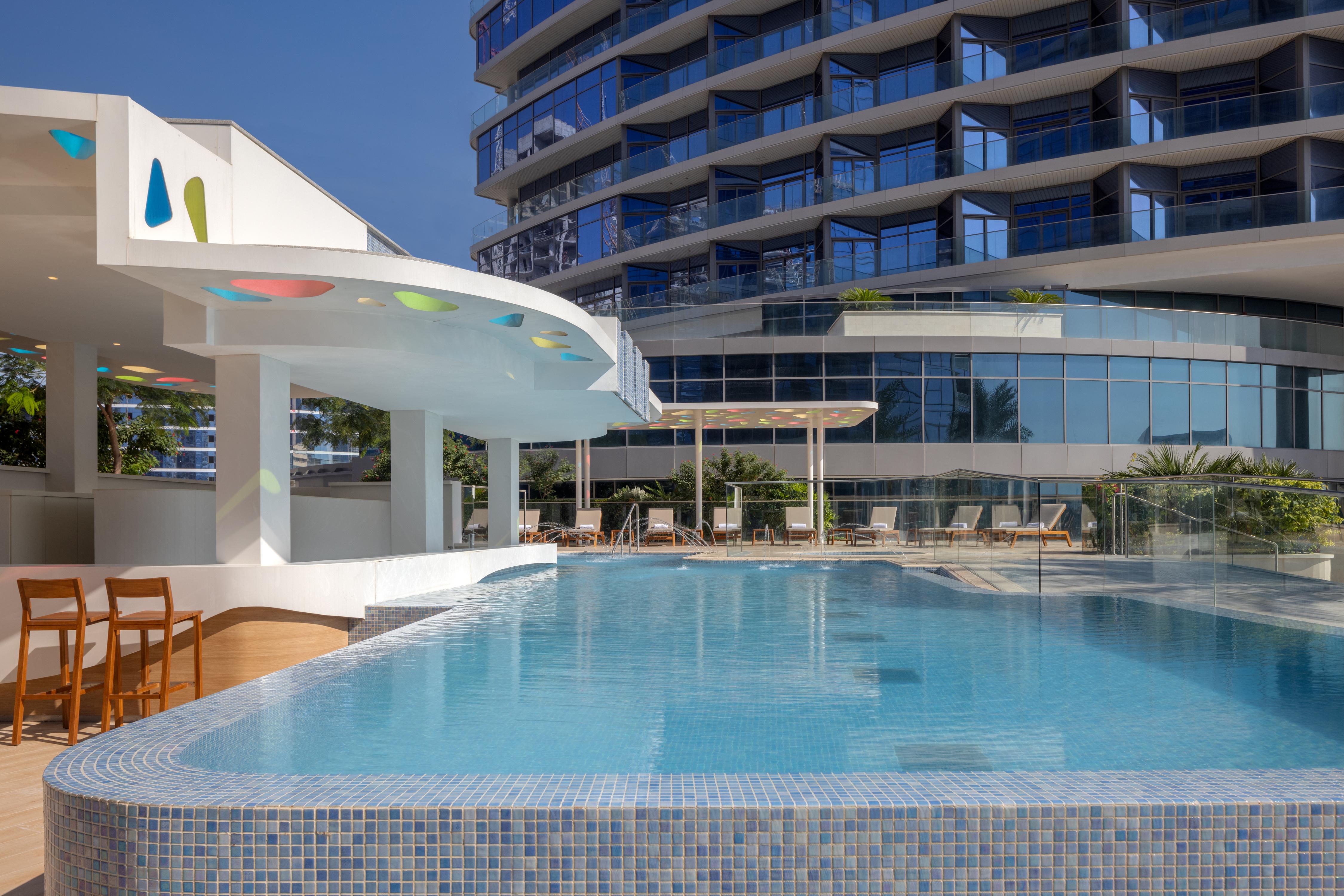 Hilton Dubai Creek Hotel & Residences - Tap to explore photos