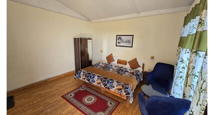 Hill View Retreat Room Type - Deluxe Room