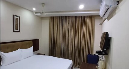 Hotel Mansha Regency Room Type - Deluxe Room AC
