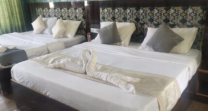 Tejas Residency & Restaurant Room Type - Delux Standard Suite Room (2King Bed)