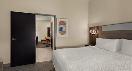 Holiday Inn Express Hotel & Suites Oklahoma City Northwest Room Type - 1 King Suite Sofa Bed Wet Bar