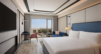 DoubleTree by Hilton Bengaluru Airport Room Type - King Deluxe Room Pool View