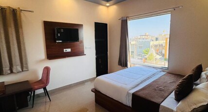 HOTEL SHREE MANGALAM AND RESTAURANT Room Type - Deluxe Room