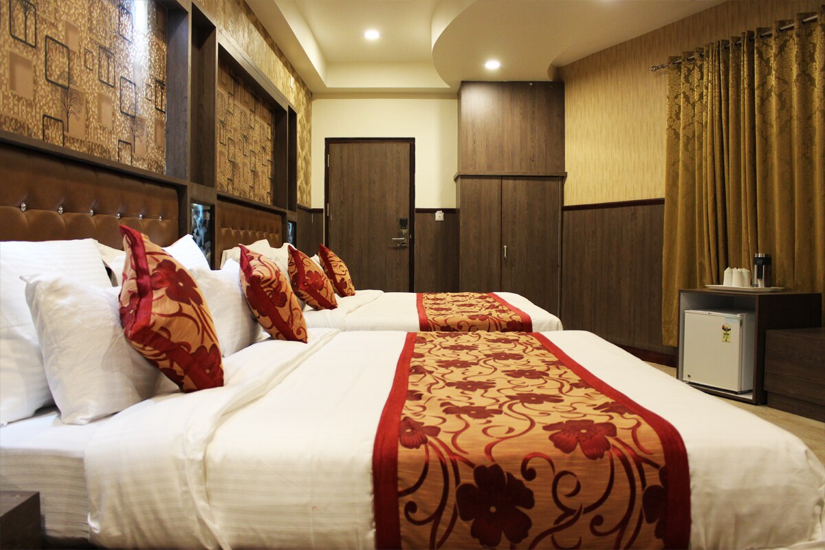 Hotel Chintpurni International (2 mins Drive to Railway Station) - Tap to explore photos