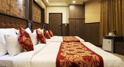 Hotel Chintpurni International (2 mins Drive to Railway Station) Room Type - Four Bedded Room