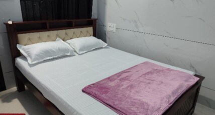 Pranav Deluxe Stay Room Type - Double Bed AC Room