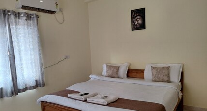 Hotel Samyukta Room Type - Deluxe Double Room with AC