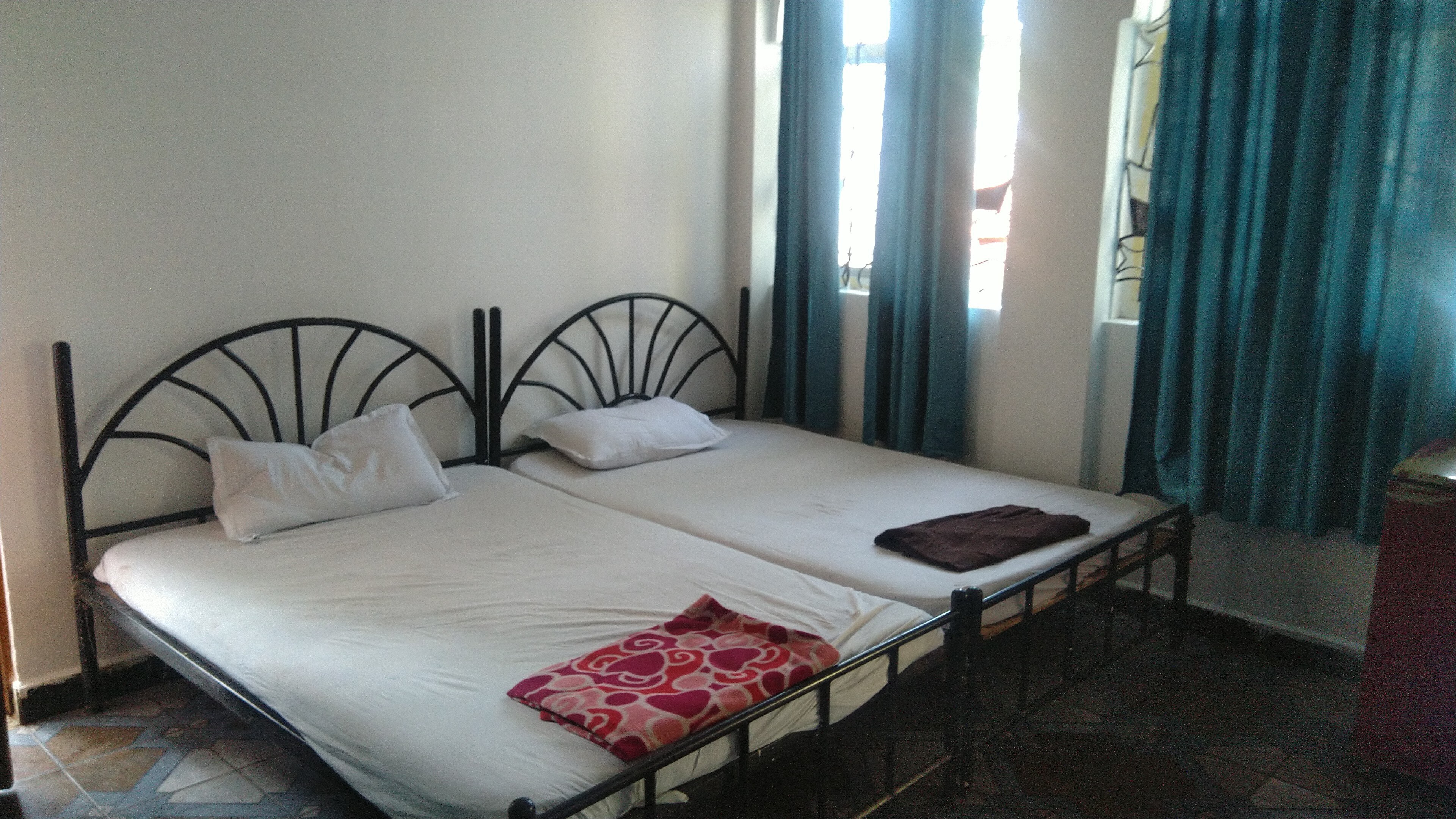 Alex AC Rooms near Calangute Beach - Tap to explore photos