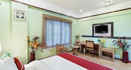 Collection O Magadi Road Metro Station Room Type - Deluxe Room