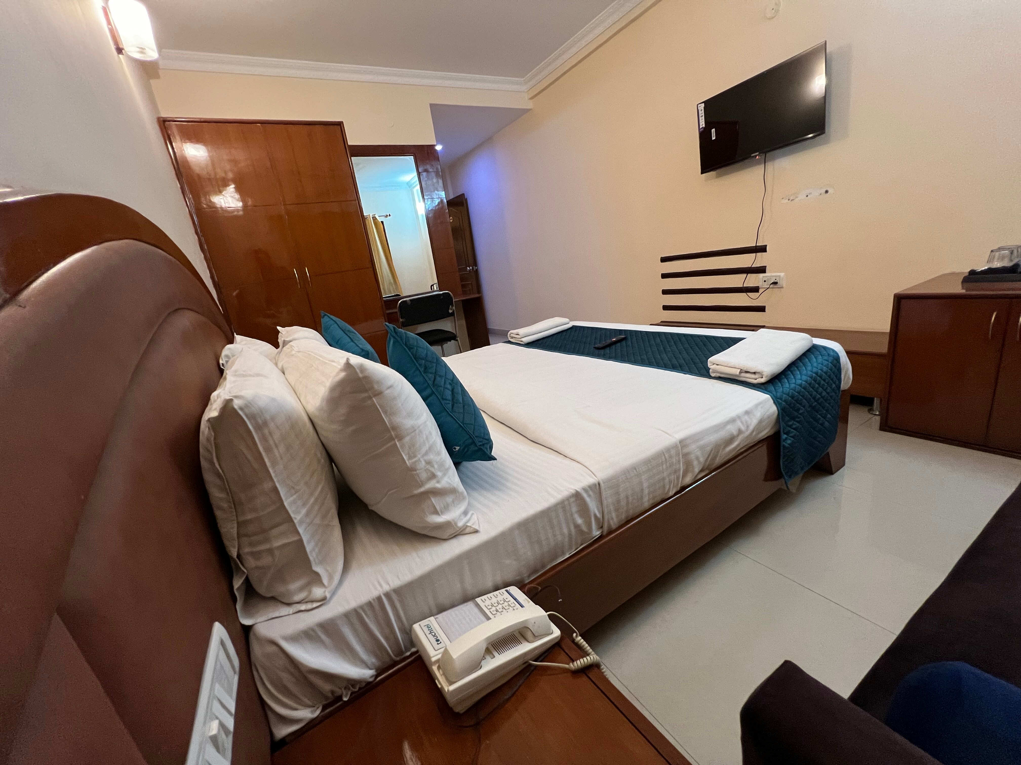 Blue Bliss Hotels By PPH Living - Infantry Road - Tap to explore photos