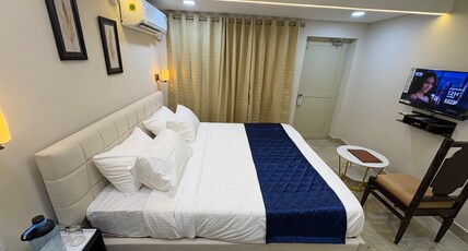 Amirtha inn by zeeyatt Regency Room Type - AMIRTHA COMFORT