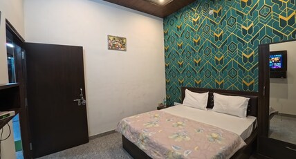 Hotel Daksh (Free Gated Parking & 10 Min walk from Temple) Room Type - Super Deluxe Double Room