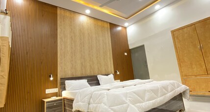 Rudraksha Inn Room Type - Deluxe AC King | Attached Washroom