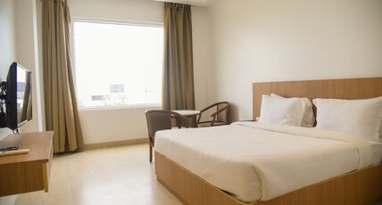 MAA KRIPA HOTEL & BANQUETS Room Type - Deluxe Room