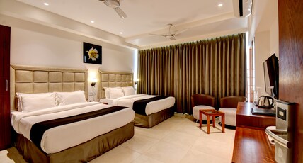 Elite Homes Room Type - Deluxe Family AC Room (2 Queen Size Beds)