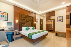 Treebo Premium Pine Tree Courtyard