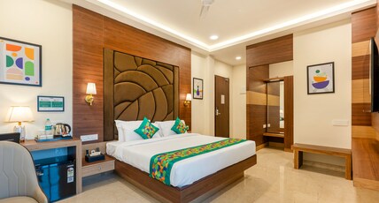 Treebo Premium Pine Tree Courtyard Room Type - Premium Room with Balcony