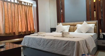 HOTEL SAI Room Type - Deluxe Room with King Bed