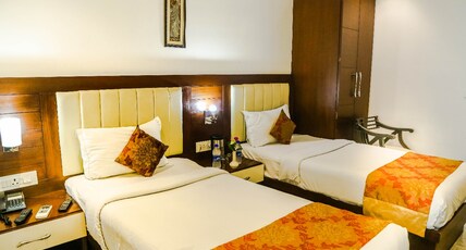 Taj Heights Room Type - Twin Room Taj Heights Room Type - Twin Room