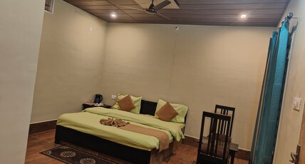 The Aaram Homestay Room Type - Premium Room with Attached kitchen
