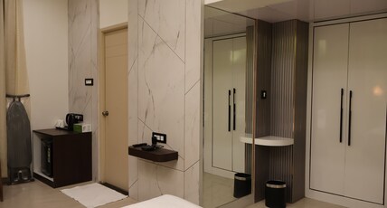 HOTEL PNS NAKSHTARA Room Type - Premium Room HOTEL PNS NAKSHTARA Room Type - Premium Room