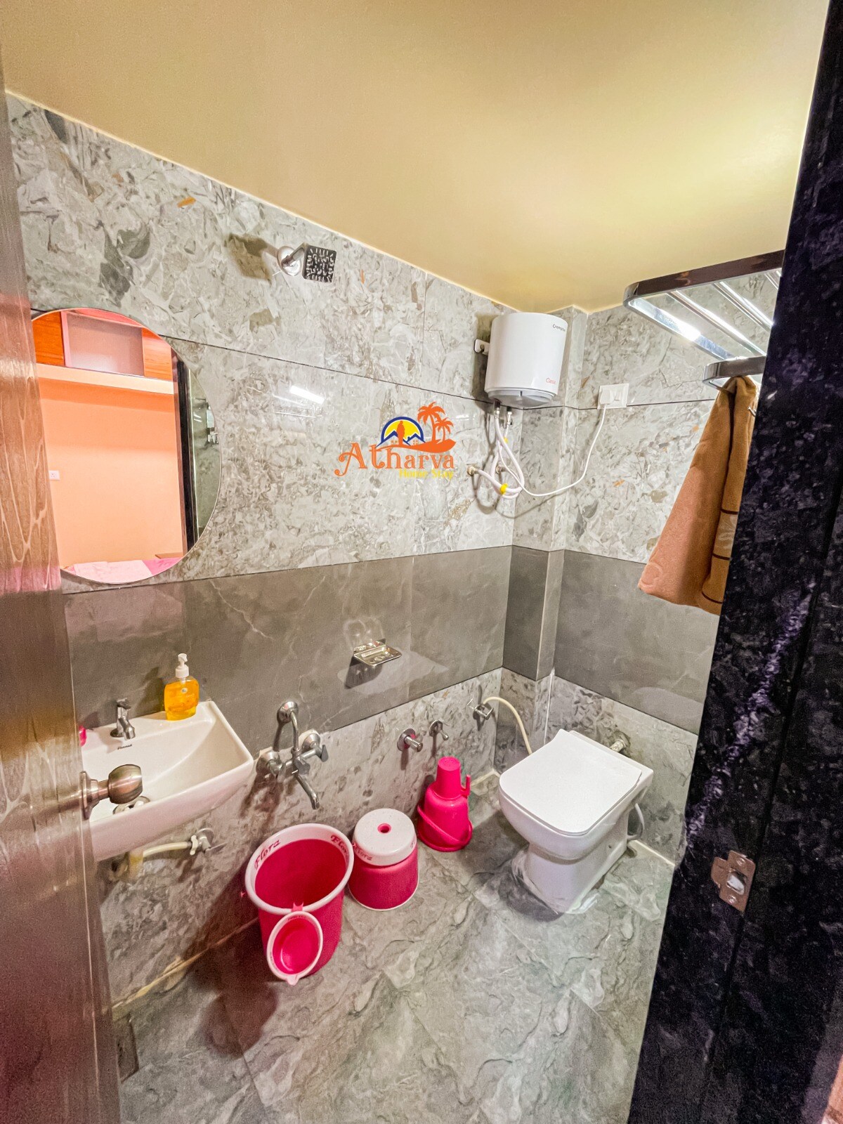 The Atharva Home Stay - Tap to explore photos