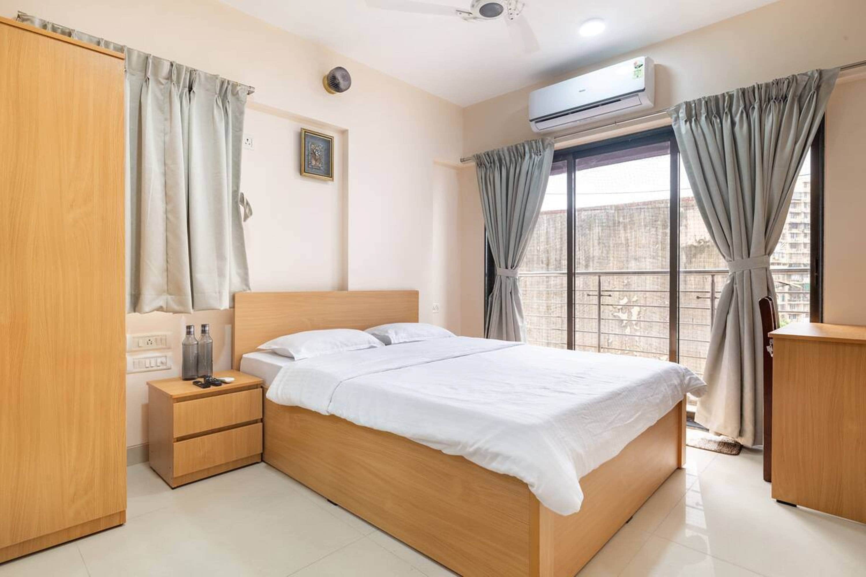 Modern 2 BHK Service Apartment in BKC - Tap to explore photos