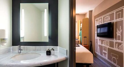 ibis Torreon Room Type - A large double bed, WIFI, LED TV with streaming, and bathroom