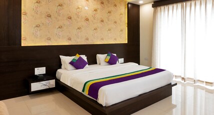 Treebo Premium Royal Amar With Mountain View and Swimming Pool Room Type - Spacious Premium Room