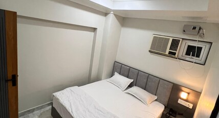GG STAY INN Room Type - Deluxe Room with Air Conditioning